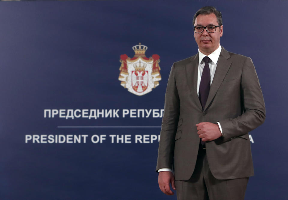 Serbian President Aleksandar Vucic stands during a ceremony in Belgrade, Serbia, Sunday, May 9, 2021. Serbia has decorated Austrian Nobel literature laureate Peter Handke, who is known for his apologist views over Serb war crimes during the 1990s' wars in the Balkans. (AP Photo/Darko Vojinovic)