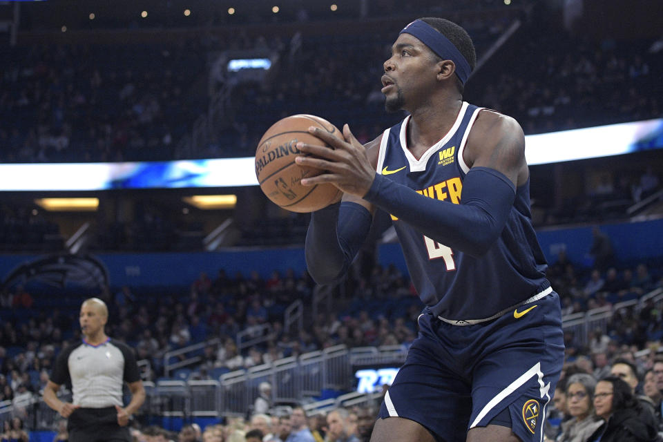 Nuggets forward Paul Millsap suffered a broken toe in his right foot on Friday night against the Hornets. (AP Photo/Phelan M. Ebenhack)