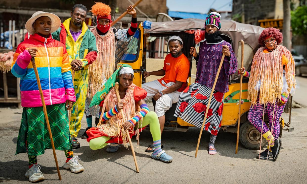 <span>Q the music<strong> … </strong>QDance in Lagos, with Onikeku seated (centre).</span><span>Photograph: Grace Ekpu</span>