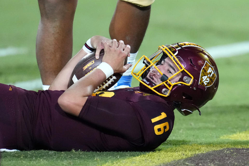 Arizona State quarterback Trenton Bourguet (16) looks at officials as he pauses in the endzone, but is called short of a touchdown, during the second half of an NCAA college football game against UCLA in Tempe, Ariz., Saturday, Nov. 5, 2022. UCLA won 50-36. (AP Photo/Ross D. Franklin)