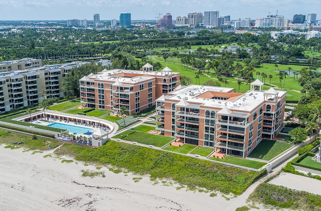 On the grounds of The Breakers in Palm Beach, the two condominium buildings the comprise 2 N. Breakers Row stand between the beach and the resort's golf course.