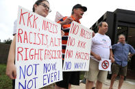 <p>Counter-demonstrators and police gather at the Vienna/Fairfax – GMU Metro Station in anticipation of the arrival of the white supremacist Unite the Right participants who plan to gather at the station before traveling to the White House August 12, 2018 in Vienna, Virginia. Thousands of protesters are expected to demonstrate against the “white civil rights” rally in Washington, which was planned by the organizer of last year’s deadly rally in Charlottesville, Virginia. (Photo: Chip Somodevilla/Getty Images) </p>