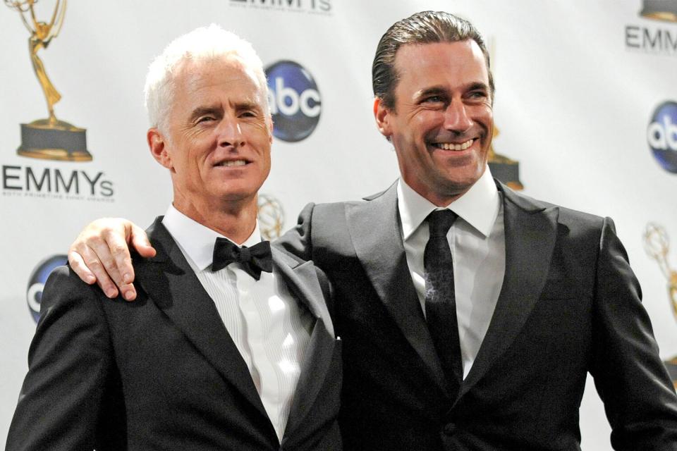 John Slattery, Jon Hamm Actors John Slattery (L) and Jon Hamm pose in the press room for their award for outstanding drama series "Mad Men" at the 60th Primetime Emmy Awards, in Los Angeles Emmy Awards Pressroom, Los Angeles, USA