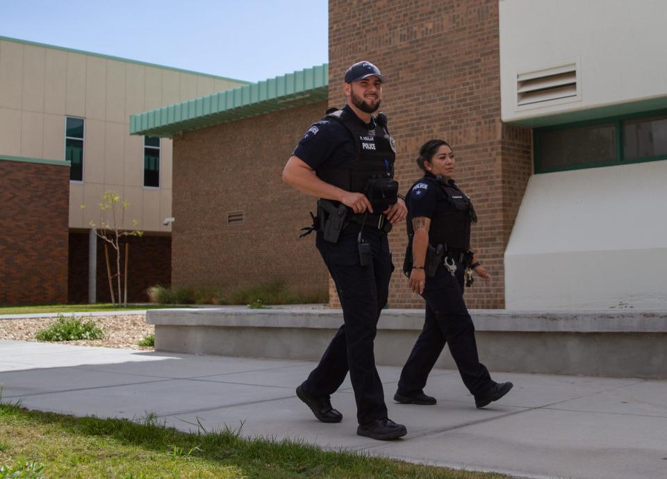 Socorro ISD police officers Rigo Aguilar and Rebecca Calvillo patrol the Montwood High School campus on Aug. 8, 2023.