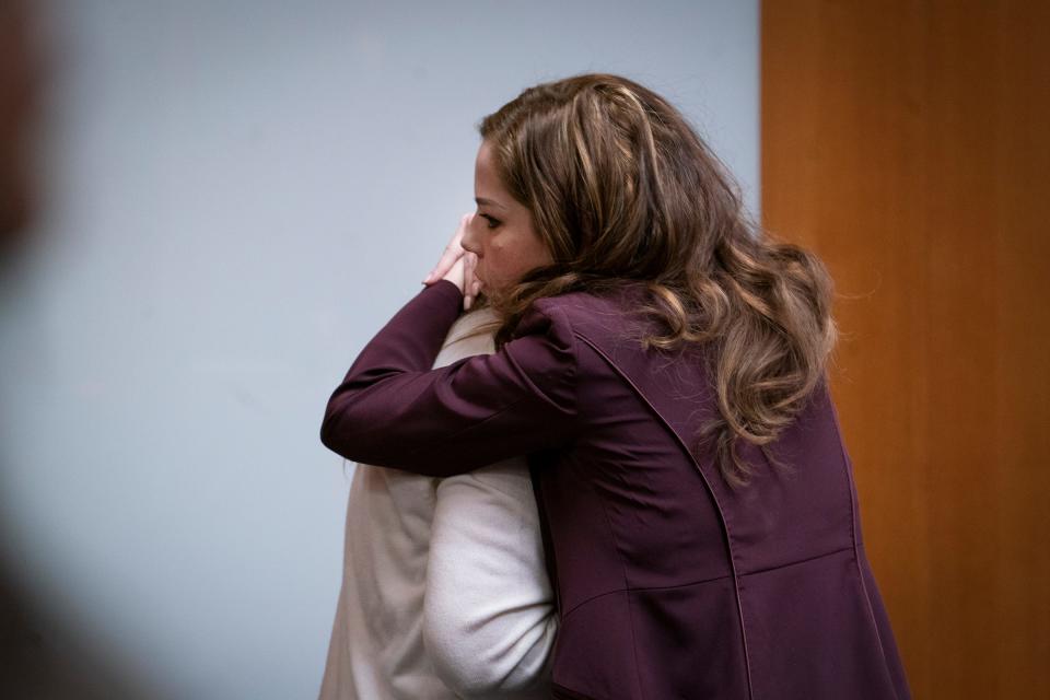 Jennifer Crumbley, left, is hugged by her attorney Shannon Smith after viewing the surveillance video of Crumbley's son perpetrating the shooting at Oxford High School on Nov. 30, 2021 in the Oakland County courtroom of Judge Cheryl Matthews on Thursday, Feb. 1, 2024. Jennifer Crumbley is being tried on four counts of involuntary manslaughter for the four students killed by her son, Ethan Crumbley, in a 2021 shooting at Oxford High School.