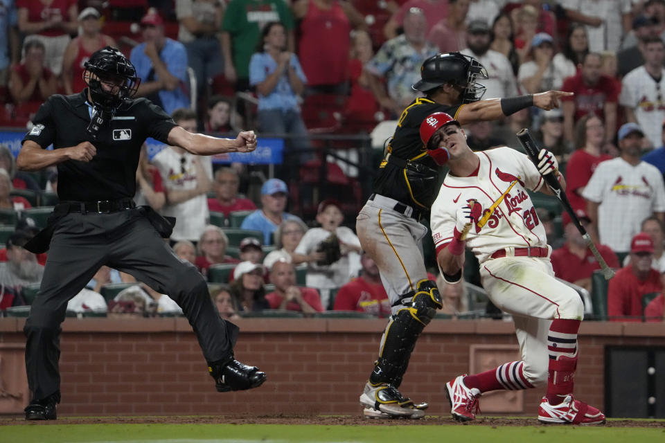 St. Louis Cardinals' Lars Nootbaar (21) reacts after being called out on strikes by home plate umpire Emil Jimenez, left, as Pittsburgh Pirates catcher Endy Rodriguez celebrates during the ninth inning of a baseball game Saturday, Sept. 2, 2023, in St. Louis. (AP Photo/Jeff Roberson)