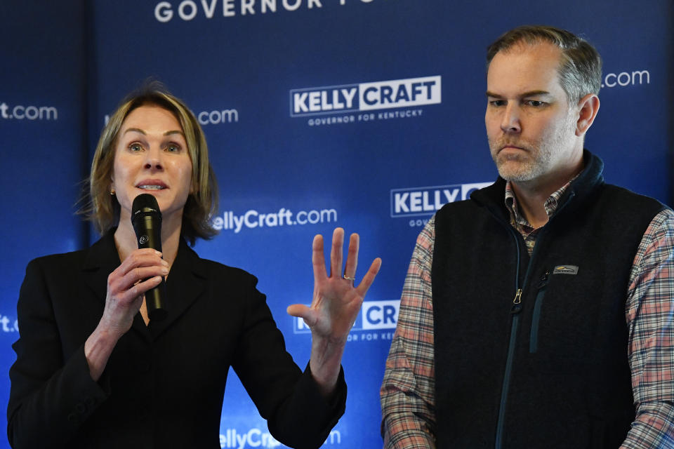 Kentucky gubernatorial candidate Kelly Craft, left, and her running mate for Lt. Governor Kentucky state Sen. Max Wise, speaks with supporters during a campaign stop in Liberty, Ky., Wednesday, May 3, 2023. (AP Photo/Timothy D. Easley)
