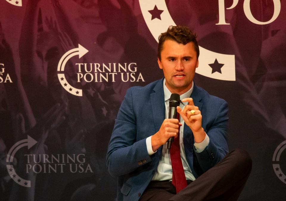 Charlie Kirk answers a question from an audience member during a Turning Point USA event at the ASU Katzin Concert Hall in Tempe on Sept. 27, 2023.