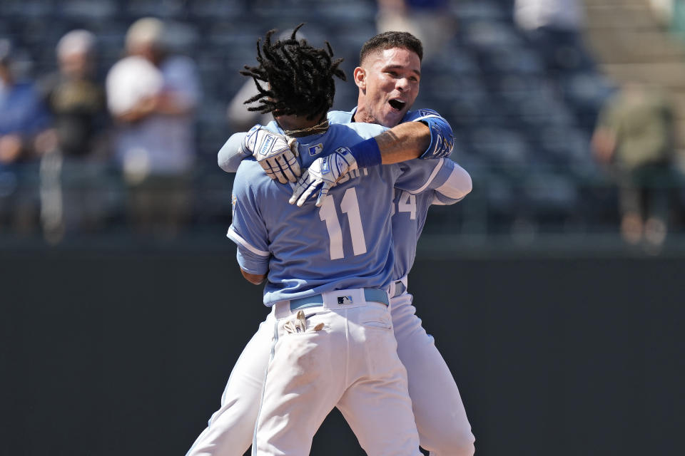 Kansas City Royals' Freddy Fermin celebrates with Maikel Garcia (11) after hitting a two-run double to win the baseball game against the Cleveland Guardians during the tenth inning Thursday, June 29, 2023, in Kansas City, Mo. The Royals won 4-3 in ten innings. (AP Photo/Charlie Riedel)