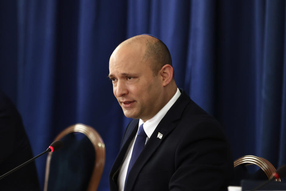 Israeli Prime Minister Naftali Bennett speaks at the weekly cabinet meeting at the Foreign Ministry in Jerusalem, Sunday, Aug. 8, 2021. (Ronen Zvulun/Pool via AP)