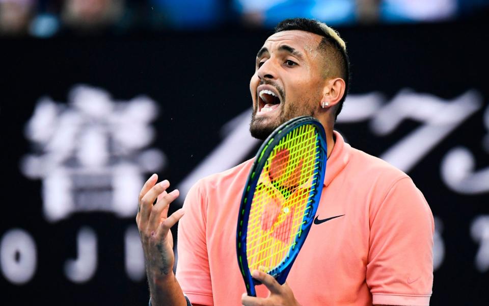 Australia's Nick Kyrgios reacts after a point against Spain's Rafael Nadal during their men's singles match on day eight of the Australian Open  - AFP
