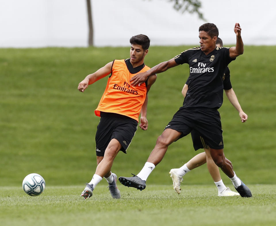 MONTREAL, QC - JULY 14: Marco Asensio (R) Raphael Varane of Real Madrid players performs continuous race exercises in their new preseason training session on July 14, 2019 in Montreal, Canada. (Photo by Helios de la Rubia/Real Madrid via Getty Images)