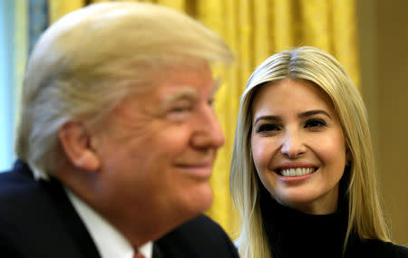 FILE PHOTO: U.S. President Donald Trump and his daughter Ivanka hold a video conference call with Commander Peggy Whitson and Flight Engineer Jack Fischer of NASA on the International Space Station from the Oval Office of the White House in Washington, U.S., April 24, 2017. To match Special Report USA-TRUMP/PANAMA REUTERS/Kevin Lamarque/File Photo