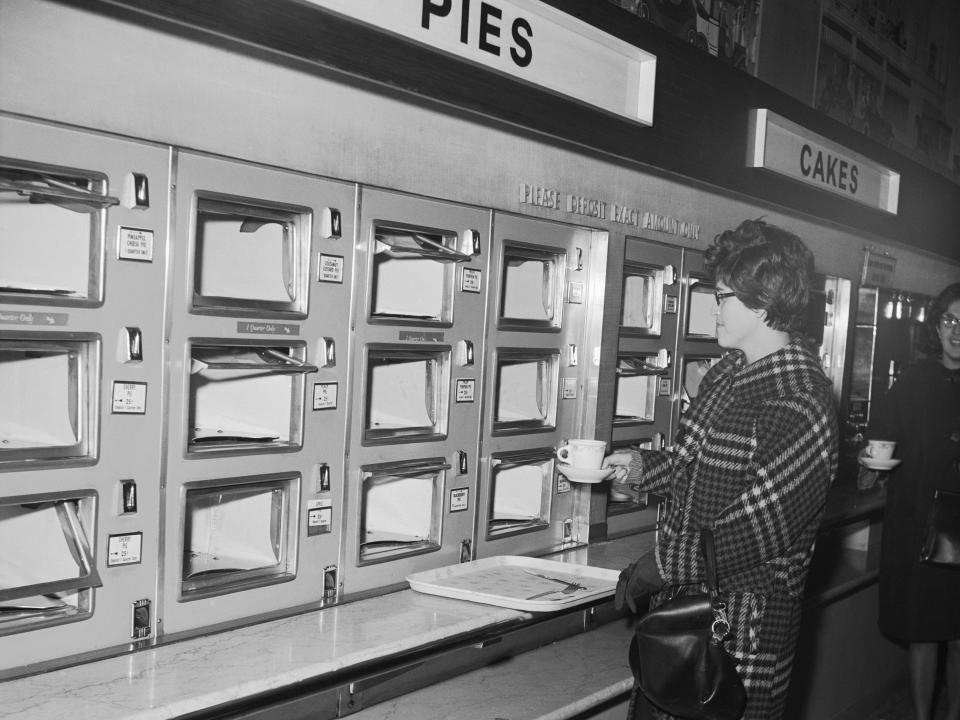 Miriam Cordova has her coffee but there is nothing to eat in the Automat machines at Horn & Hardart's Restaurant at 42nd Street and Third Ave., early Nov. 10 1965. Because of the blackout which struck the city and most of the northeast, crowds jammed the restaurants and ate up almost everything in sight.