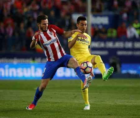 Football Soccer- Spanish La Liga Santander - Atletico Madrid v Villarreal- Vicente Calderon Stadium, Madrid, Spain - 25/04/17 - Atletico Madrid's Saul Niguez and Villarreal's Bruno Soriano in action. REUTERS/Susana Vera