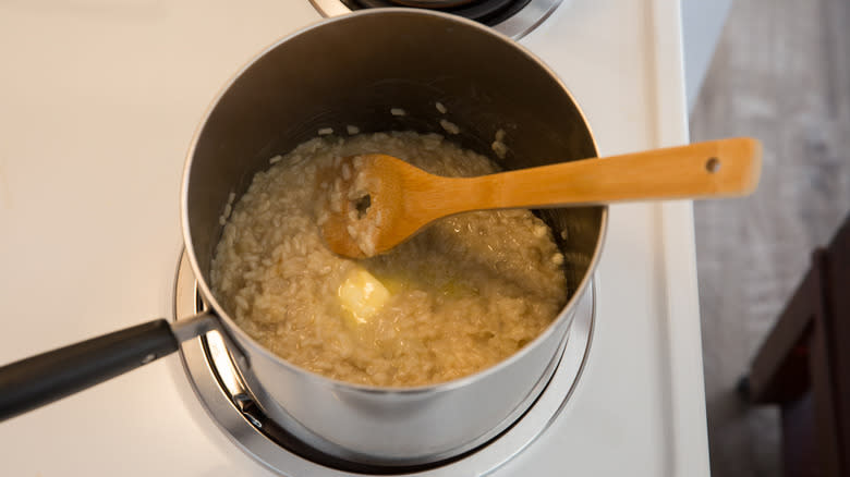 melted butter in risotto pan 