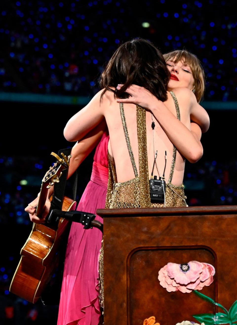 PHOTO: Taylor Swift and Gracie Abrams embrace on stage during 'Taylor Swift | The Eras Tour' at Wembley Stadium, June 23, 2024, in London. (Gareth Cattermole/TAS24/Getty Images)
