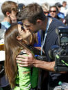 <p>A kiss for luck! The racecar driver and her quarterback boyfriend made their love known, as they went for full-on PDA before the NASCAR Daytona 500 in Daytona Beach, Fla., on Sunday. (Photo: AP Photo/Reinhold Matay) </p>