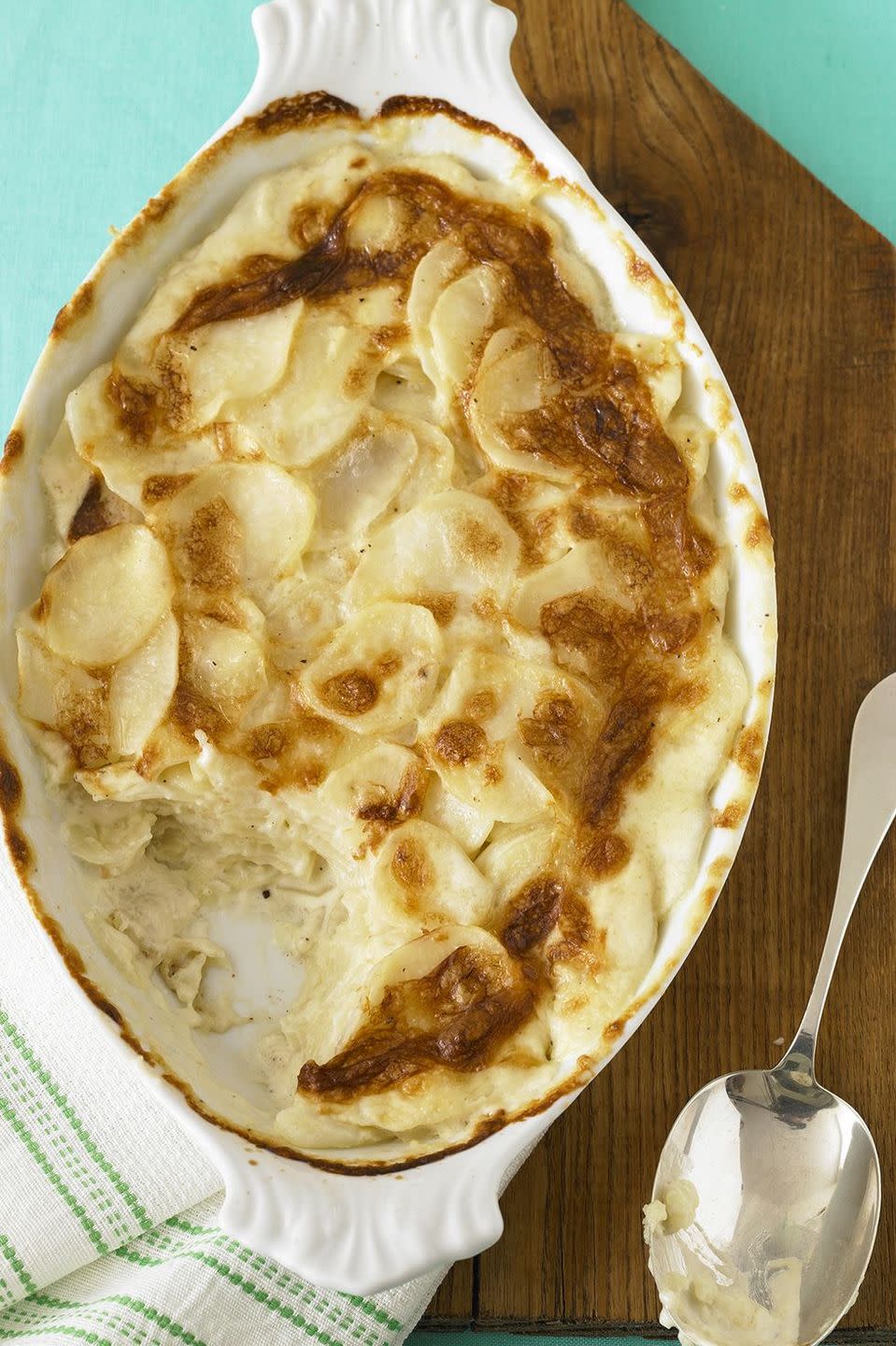 <p>Lather your baking dish in garlic and butter to give these scalloped potatoes the cushion of flavor they deserve.</p><p><strong><em><a href="https://www.womansday.com/food-recipes/food-drinks/recipes/a11514/scalloped-potatoes-recipe-122901/" rel="nofollow noopener" target="_blank" data-ylk="slk:Get the Garlic Scalloped Potatoes Recipe;elm:context_link;itc:0;sec:content-canvas" class="link ">Get the Garlic Scalloped Potatoes Recipe</a>. </em></strong></p>