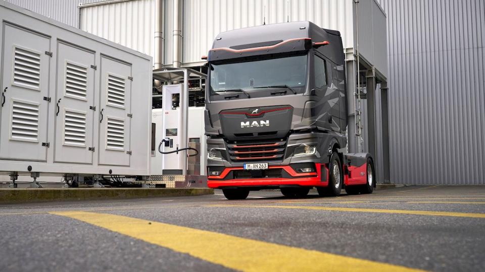 a semi truck parked in a garage