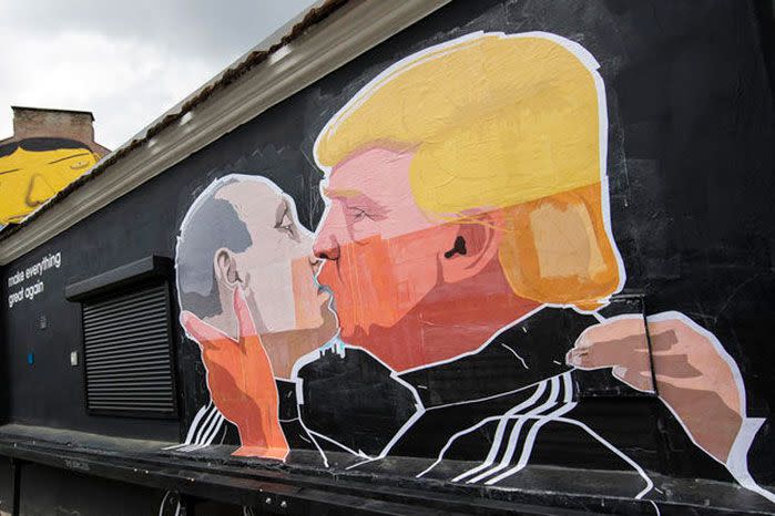 A mural on a restaurant wall depicting Trump and Putin greeting each other with a kiss in the Lithuanian capital Vilnius. Image: MSNBC