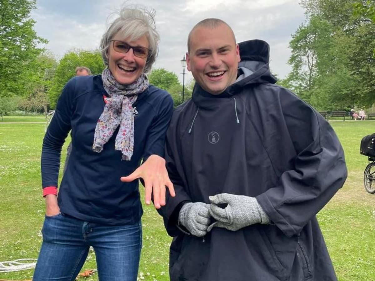 Emma Lyon and scuba diver Matt Peters who found the ring. (SWNS)