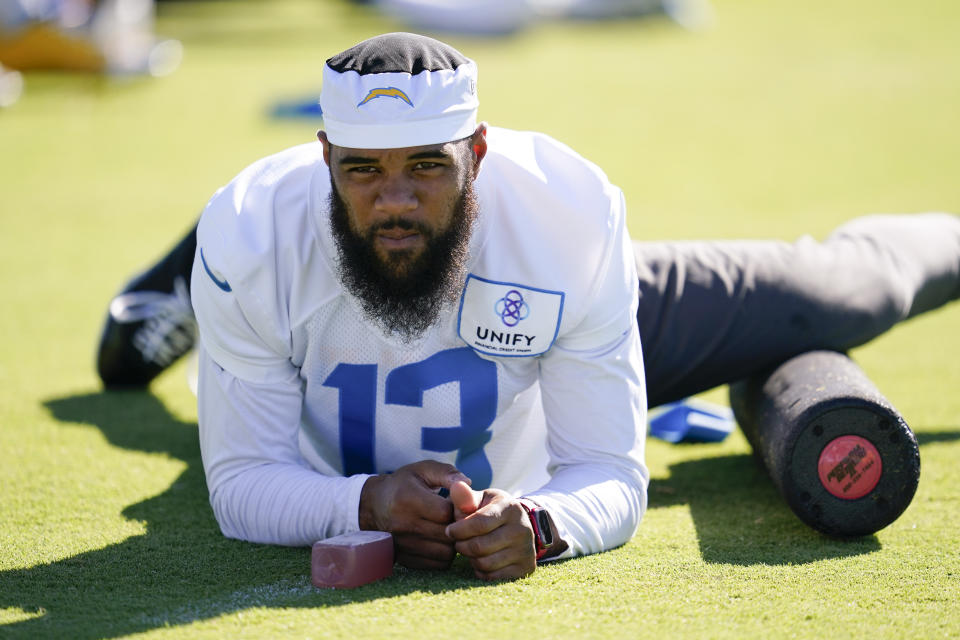 Los Angeles Chargers wide receiver Keenan Allen (13) participates in drills at the NFL football team's practice facility in Costa Mesa, Calif. Thursday, Aug. 11, 2022. (AP Photo/Ashley Landis)