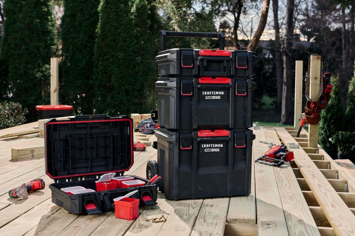 Craftsman tools and tool boxes on new deck being built on a sunny summer day