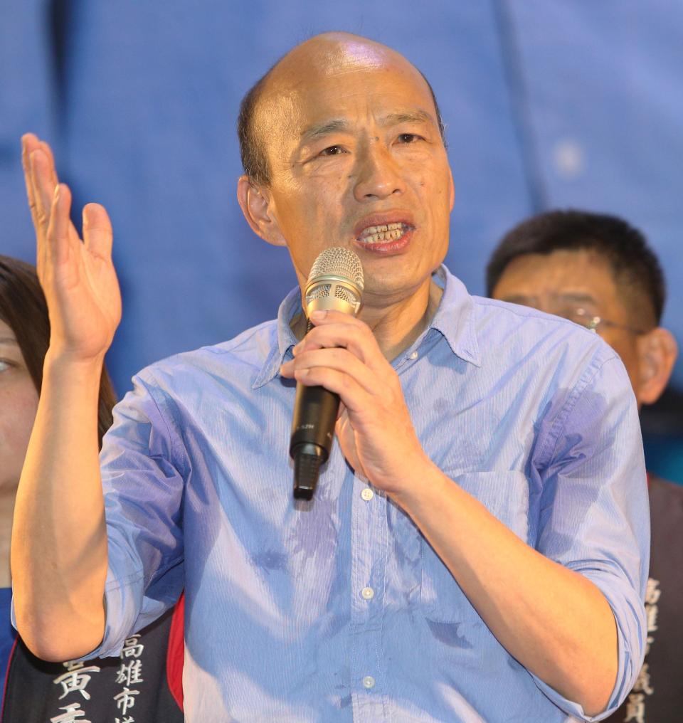 This picture taken on October 10, 2018 shows Han Kuo-yu, Kaohsiung mayor candidate from the main opposition Kuomintang (KMT), speaking during a rally in Kaohsiung, southern Taiwan. - When Taiwan goes to the polls on November 24, 2018 in local elections, it will not only be a test for President Tsai Ing-wen's embattled government but a crucial vote on divisive issues that could rile China. (Photo by STR / AFP) / TO GO WITH STORY: Taiwan-China-vote-referendum-politics, ADVANCER by Amber WANG        (Photo credit should read STR/AFP via Getty Images)