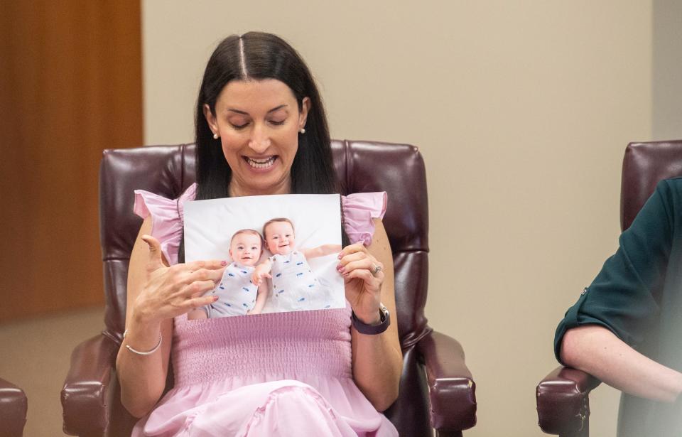 Julie Cohen talks about her twins she conceived through IVF during a conversation with Health and Human Services Secretary Xavier Becerra and IVF patients in Birmingham, Ala., on Tuesday, Feb. 27, 2024.