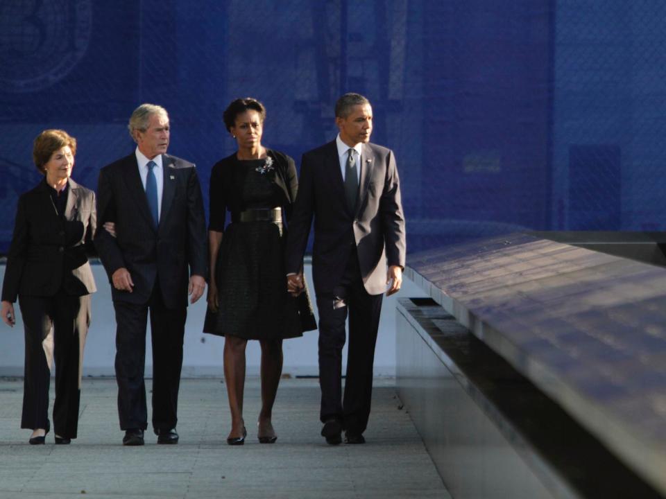 President Barack Obama, right, first lady Michelle Obama, second from right, former President George W. Bush second from left, and former first lady Laura Bush arrive at the National September 11 Memorial for a ceremony marking the 10th anniversary of the attacks at World Trade Center, Sunday, Sept. 11, 2011 in New York.