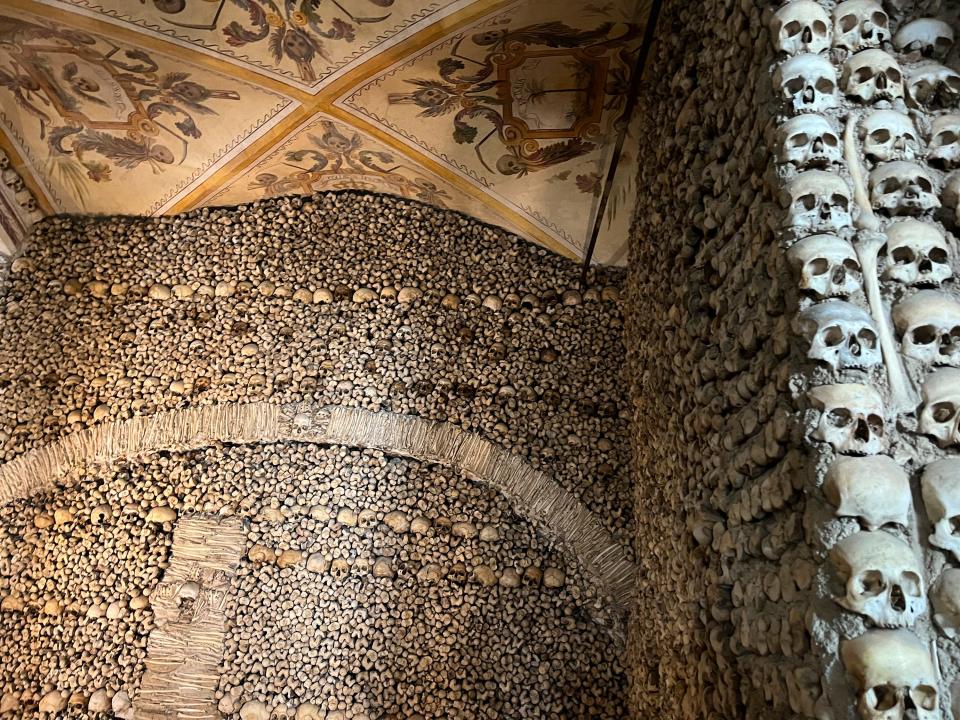 Skeletal remains of an estimated 5,000 people appear inside the Capela dos Ossos, a chapel built by Franciscan monks, in Évora, Portugal on Sept. 20, 2023. (Kristen de Groot via AP)