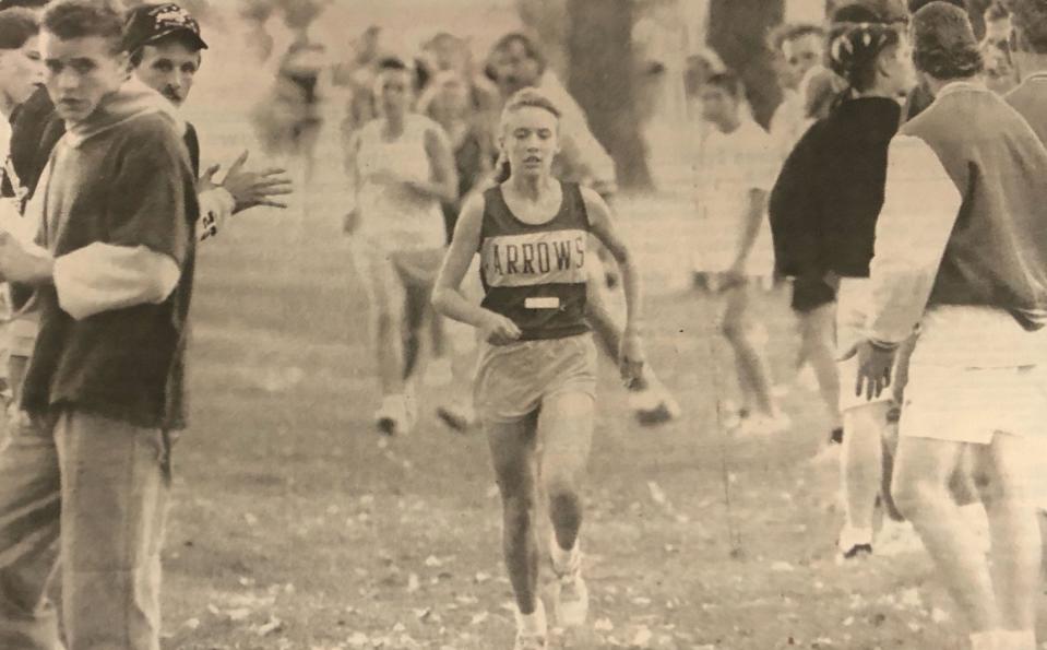 Tammy Harding is pictured leading a girls division race during a Watertown Invitational cross country meet in the early 1990s at the Watertown Municipal Golf Course.