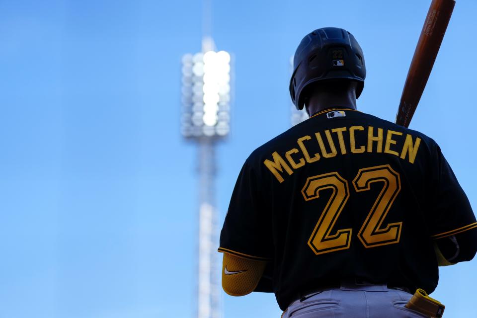 Pittsburgh Pirates right fielder Andrew McCutchen (22) warmed up in the on-deck circle in the fourth inning of the MLB Opening Day game between the Cincinnati Reds and the Pittsburgh Pirates at Great American Ball Park in downtown Cincinnati on Thursday, March 30, 2023. The Pirates led 4-2 in the fifth inning.