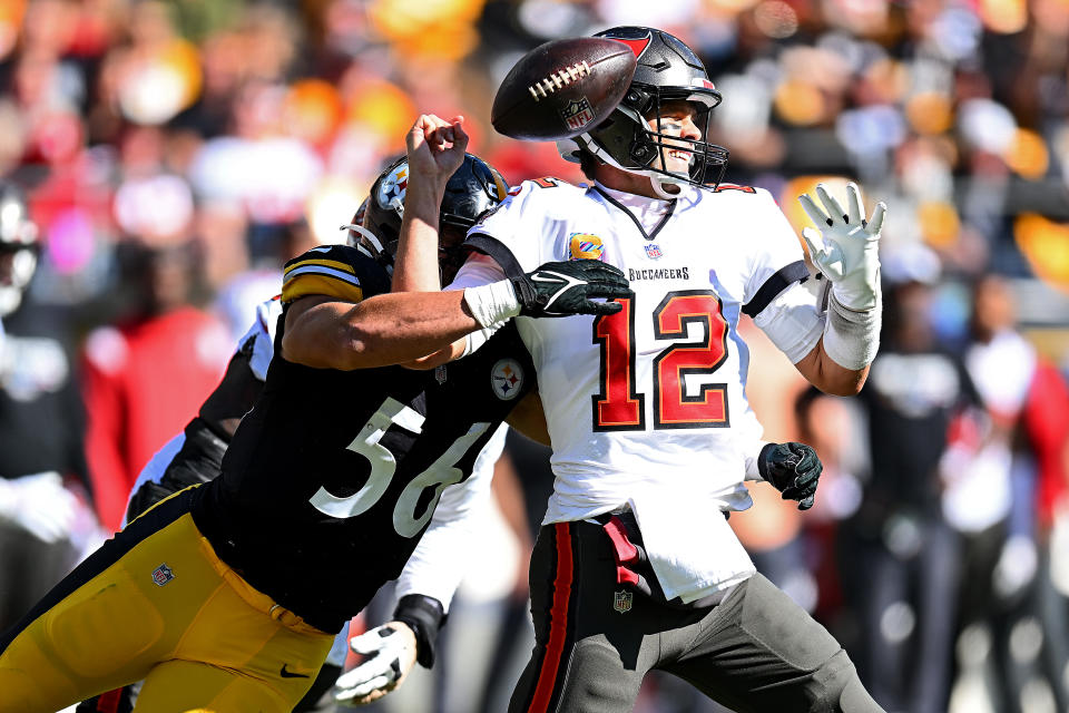 PITTSBURGH, PENNSYLVANIA - OCTOBER 16: Alex Highsmith #56 of the Pittsburgh Steelers forces a fumble by Tom Brady #12 of the Tampa Bay Buccaneers during the second quarter at Acrisure Stadium on October 16, 2022 in Pittsburgh, Pennsylvania. (Photo by Joe Sargent/Getty Images)