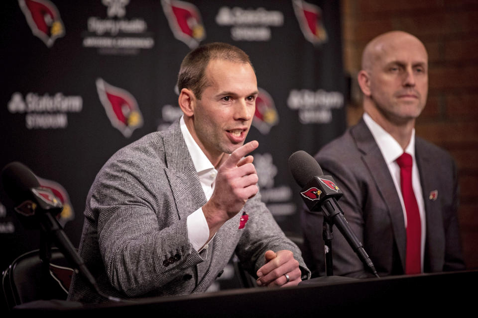 Arizona Cardinals new head coach Jonathan Gannon, left, speaks during an NFL football press conference, Thursday, Feb. 16, 2023 at the team's training facility in Tempe, Ariz. (AP Photo/Alberto Mariani)