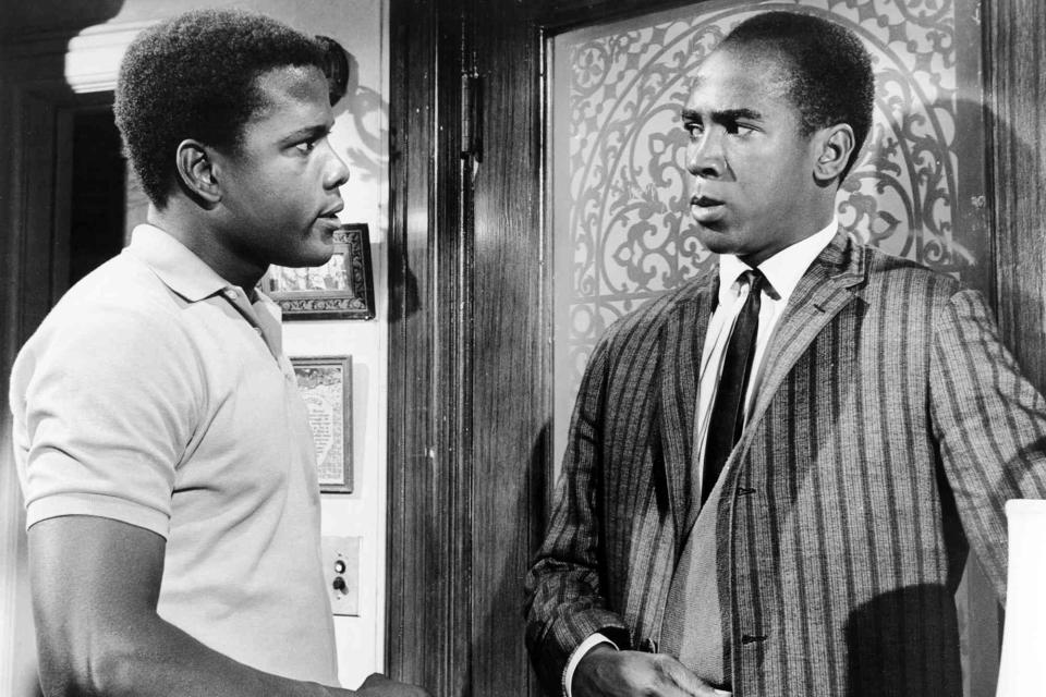 <p>Courtesy Everett Collection</p> Sidney Poitier and Louis Gossett Jr. in <em>A Raisin in the Sun</em> (1961)