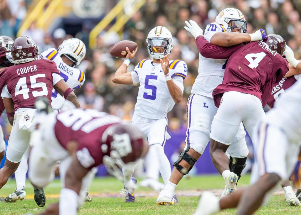 Quarterback Jayden Daniels 5 as the LSU Tigers take on Texas A&M in Tiger Stadium in Baton Rouge, Louisiana, November 25, 2023.