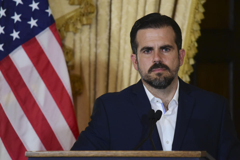 Puerto Rico governor Ricardo Rossello holds a press conference, almost two days after federal authorities arrested the island's former secretary of education and five other people on charges of steering federal money to unqualified, politically connected contractors, in San Juan, Puerto Rico, Thursday, July 11, 2019. At the time of the arrests, Rossello was in the middle of a family vacation in France, which he canceled to travel back to the Island. U.S. Attorney for Puerto Rico Rosa Emilia Rodríguez said Gov. Ricardo Rossello was not involved in the investigation. (AP Photo/Carlos Giusti)