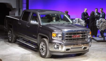 General Motors displays its 2014 GMC Sierra full-size pickup truck after unveiling it and the 2014 Chevrolet Silverado full-size pickup truck in Pontiac, Michigan in this file photo from December 13, 2012. REUTERS/Rebecca Cook/Files