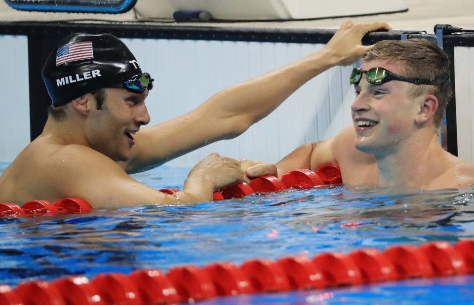 Cody Miller and Adam Peaty shake hands. (Reuters)