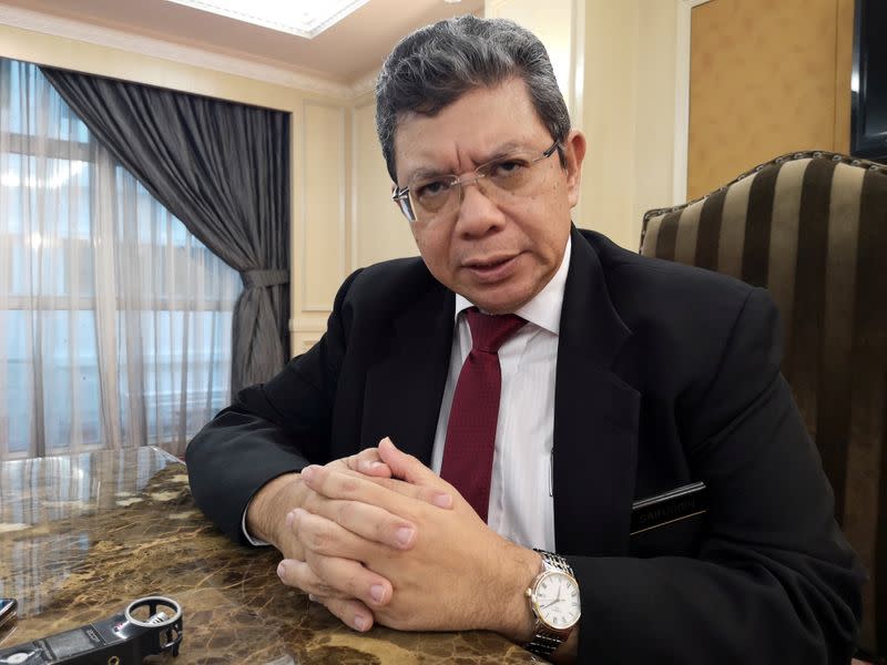 FILE PHOTO: Malaysian Foreign Minister Saifuddin Abdullah speaks during an interview with Reuters in Kuala Lumpur