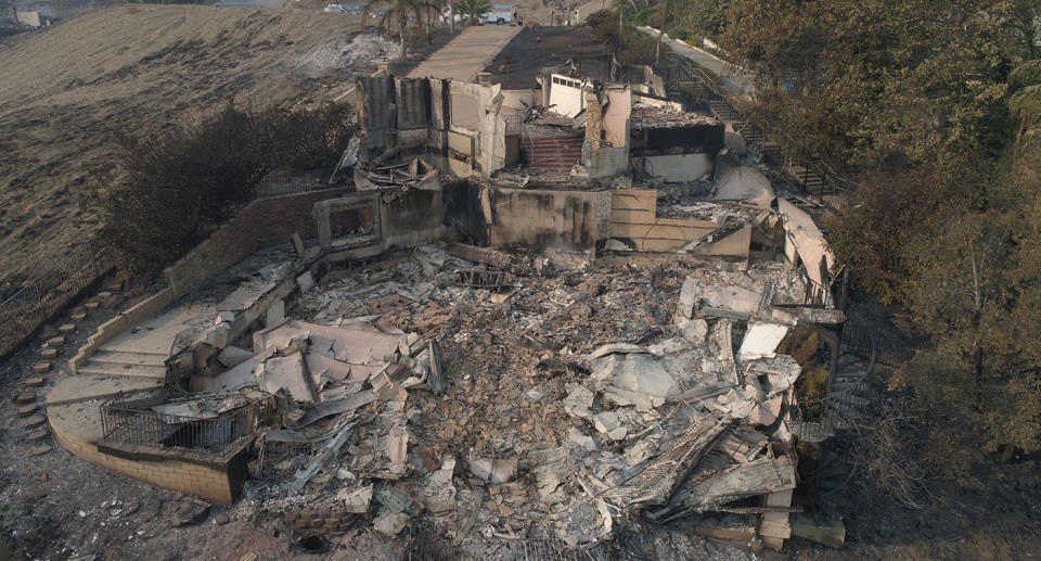 California fires: Drone still of Australian director Neil Johnson's Malibu home, which he shares with actress Tracey Birdsall, after it burned down.