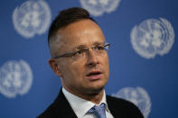 Peter Szijjarto, Hungary's minister of foreign affairs and trade, speaks during an interview with the Associated Press at United Nations headquarters, Thursday, Sept. 23, 2021, during the 76th Session of the U.N. General Assembly in New York. (AP Photo/John Minchillo)