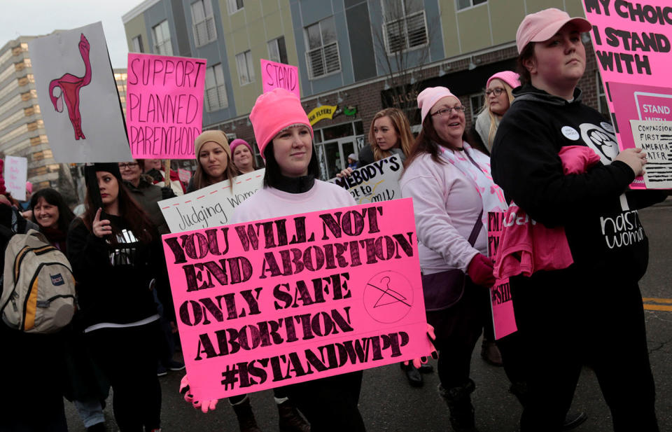 <p>Pro-abortion-rights supporters of Planned Parenthood rally outside a Planned Parenthood clinic in Detroit, Mich., Feb. 11, 2017. (Photo: Rebecca Cook/Reuters) </p>