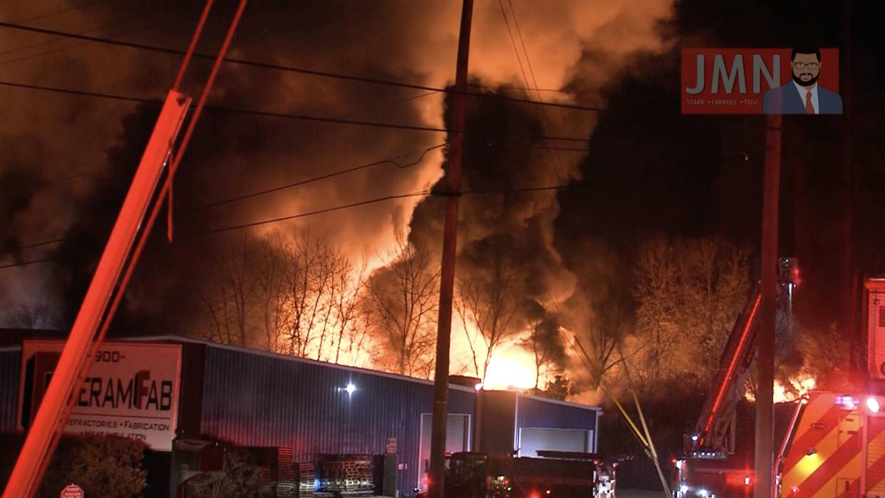 In this image from Jordan Miller News, a fire burns in train cars early Saturday morning after a train derailment in East Palestine, Ohio.