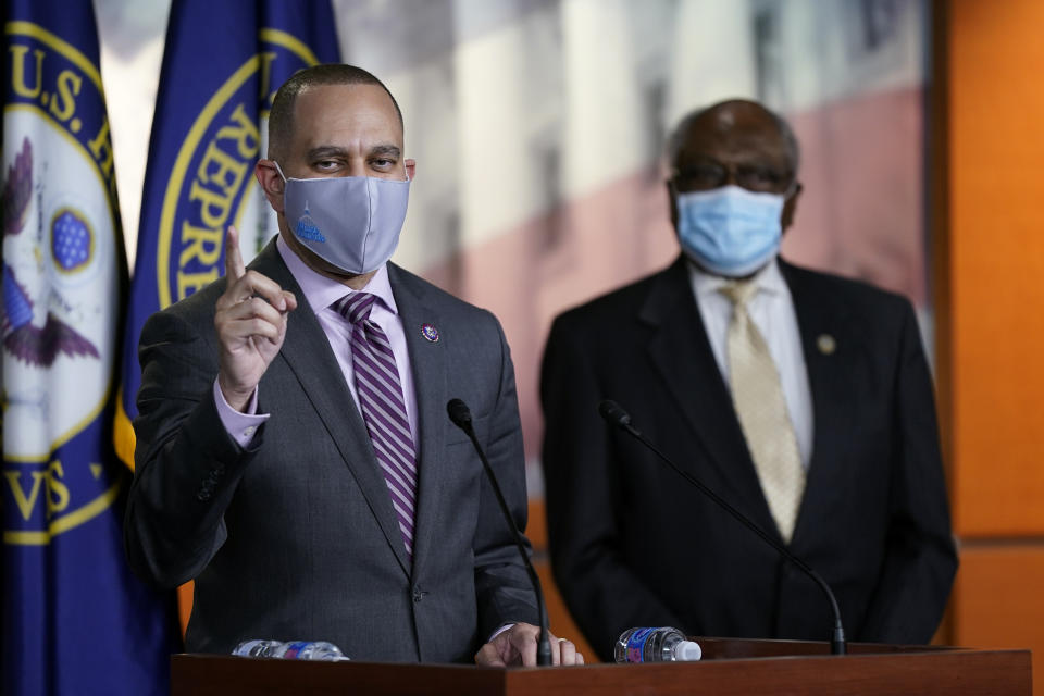 Rep. Hakeem Jeffries, D-N.Y., speaks during a news conference before participating in the House Democratic Issues Conference on Capitol Hill in Washington, Tuesday, March 2, 2021. Standing behind Jeffries is House Majority Whip James Clyburn, of S.C. (AP Photo/Patrick Semansky)