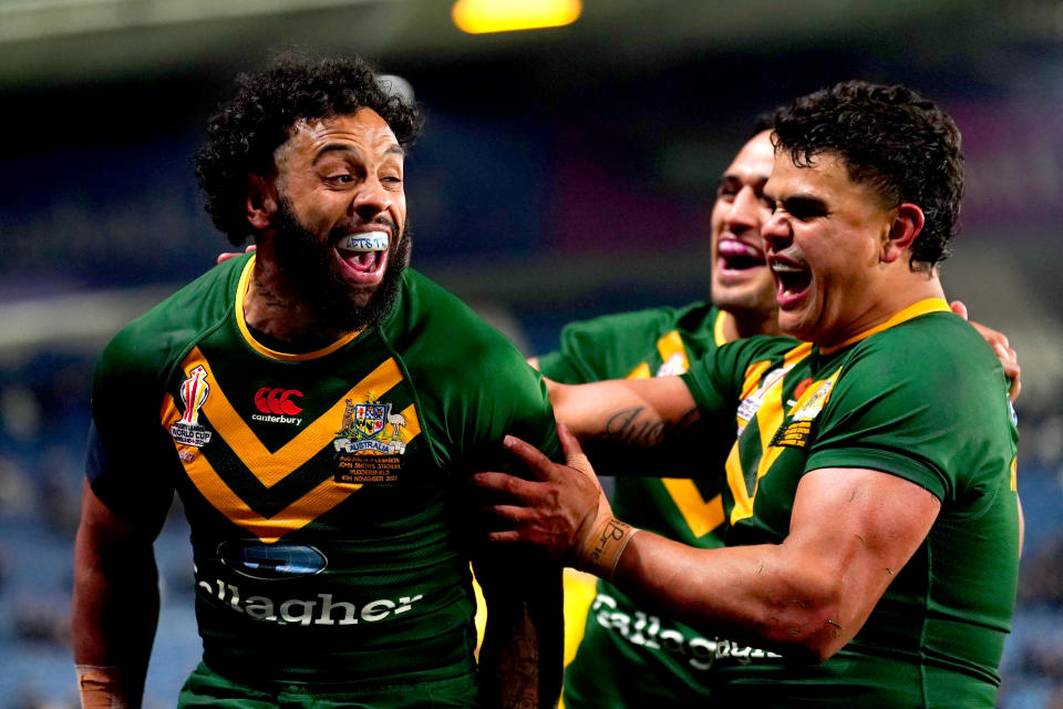 Australia's Josh Addo-Carr (pictured left) celebrates with his teammates.