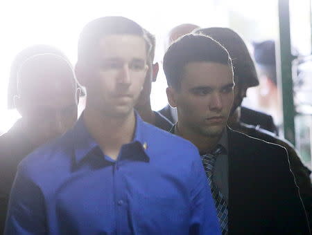 U.S. Marine Lance Corporal Joseph Scott Pemberton (R) is escorted into a court in Olongapo city, north of Manila December 1, 2015. REUTERS/Romeo Ranoco