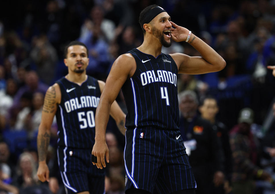 Nov 29, 2023; Orlando, Florida, USA; Orlando Magic guards Jalen Suggs (4) and Cole Anthony (50) celebrate after a basket against the Washington Wizards during the second half at Amway Center. Mandatory Credit: Kim Klement Neitzel-USA TODAY Sports